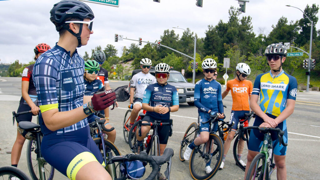 Kristen Arnold with some of the juniors she coaches on a ride.