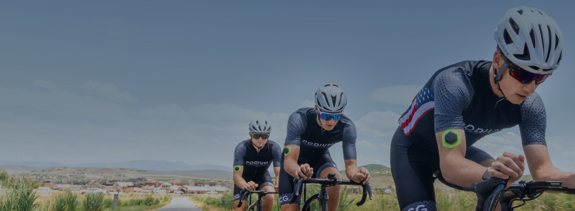 Nix Biosensor And Trainingpeaks Male Cycling Team Riding In Single File While Wearing Nix Biosensor